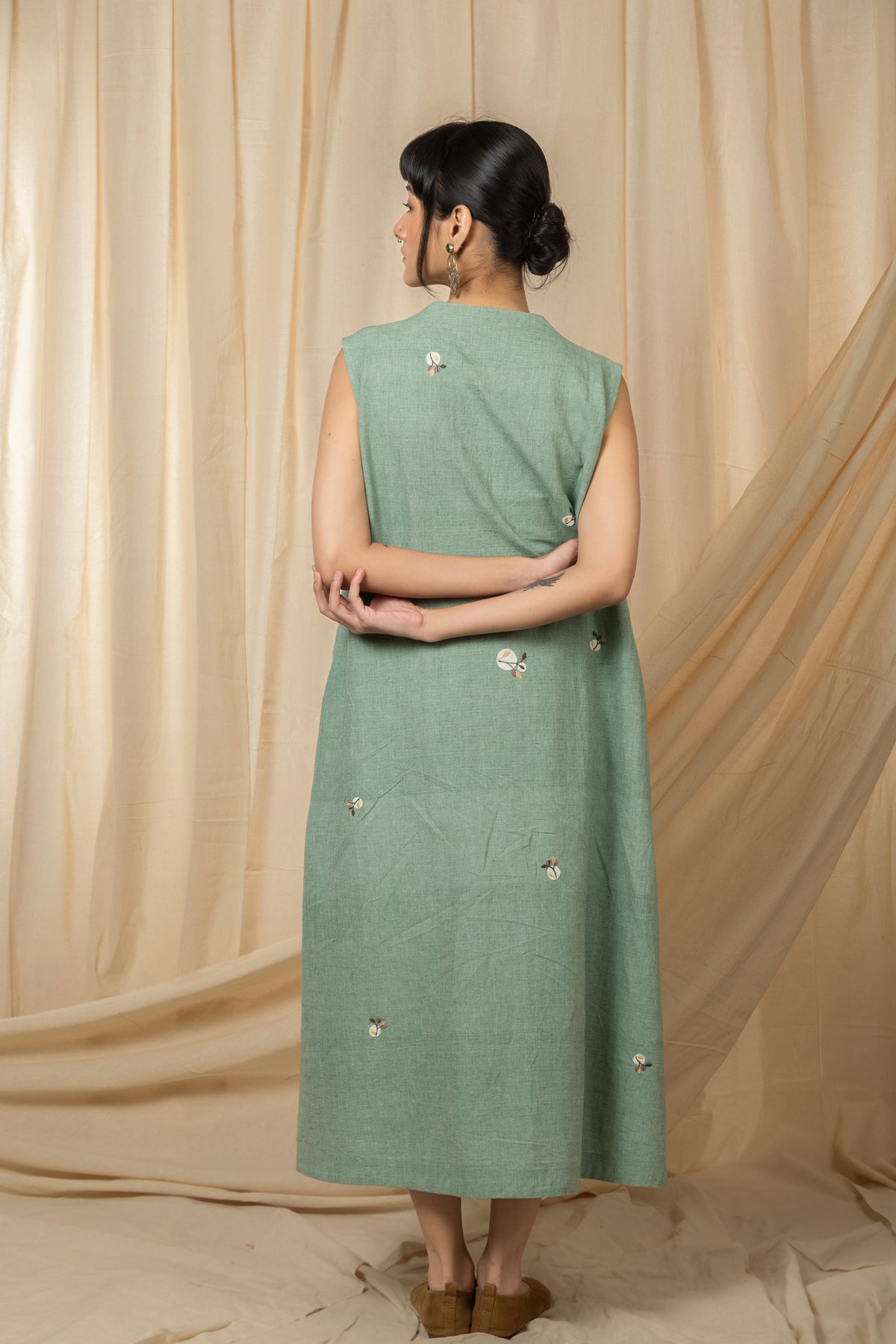 Sage green sleeveless embroidered midi dress