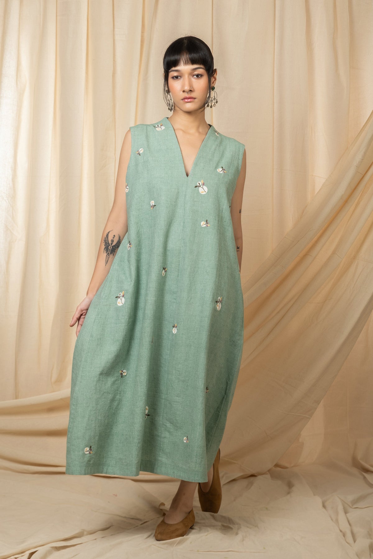 Sage green sleeveless embroidered midi dress