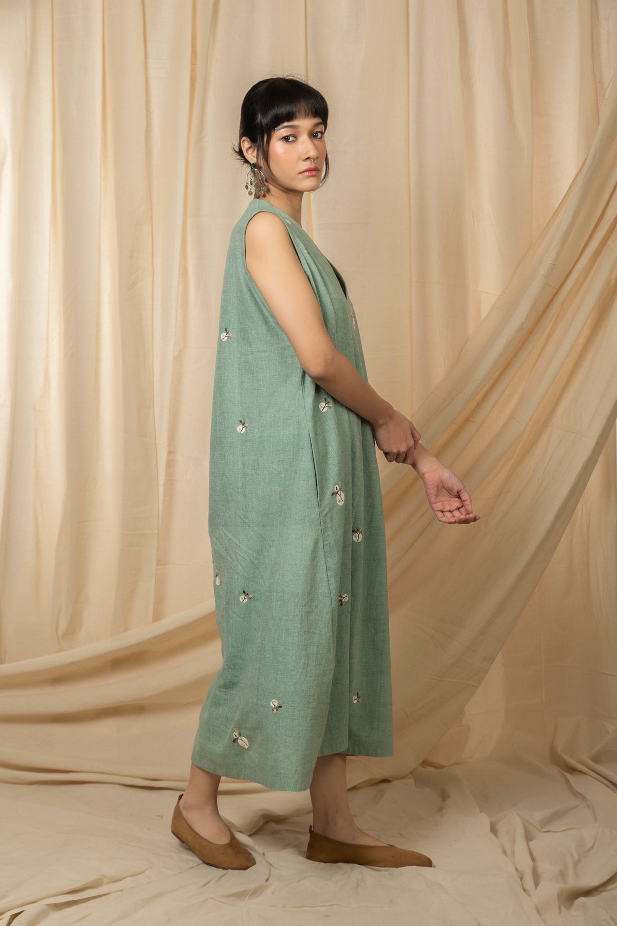 Sage green sleeveless embroidered midi dress