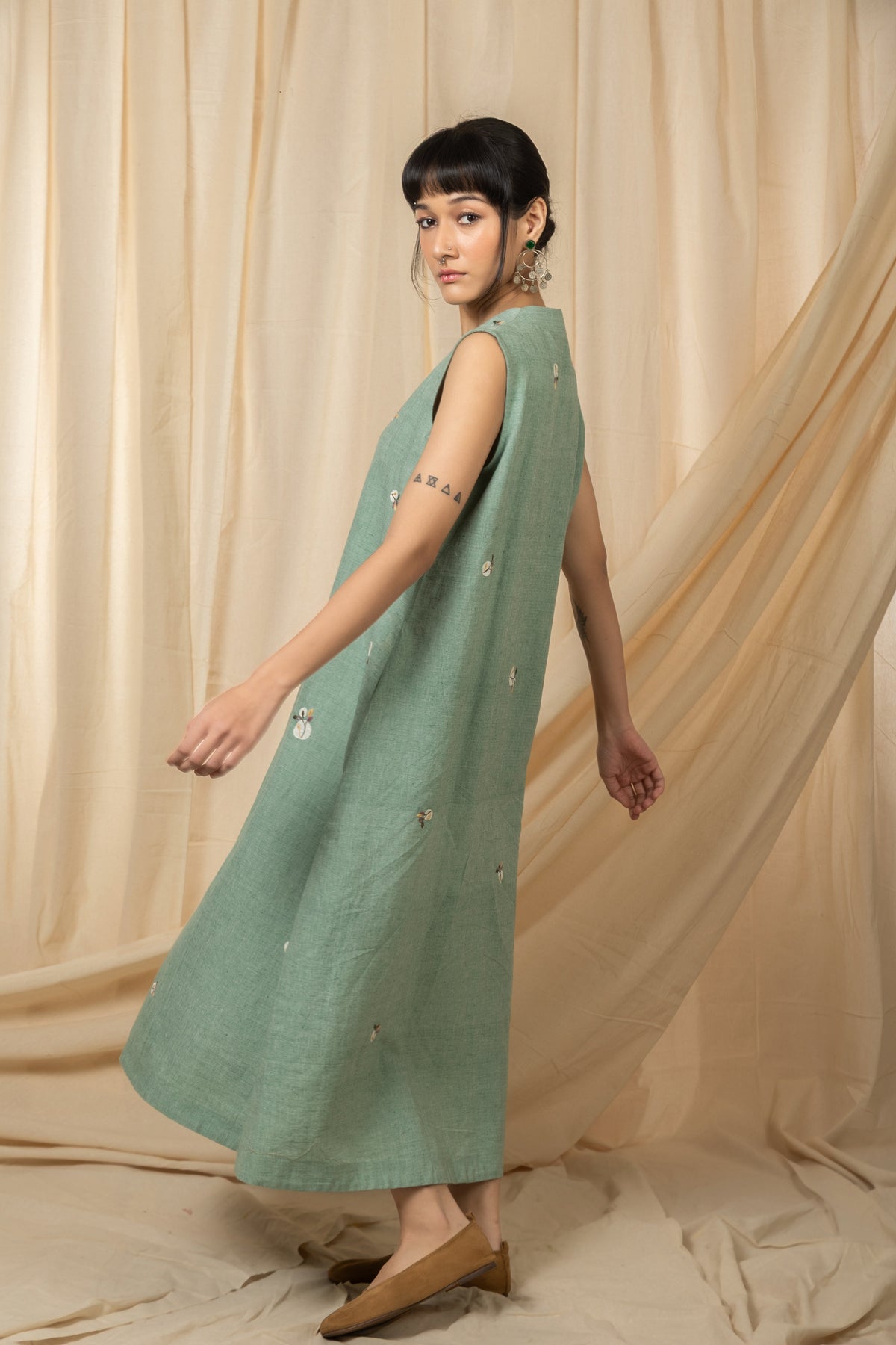 Sage green sleeveless embroidered midi dress