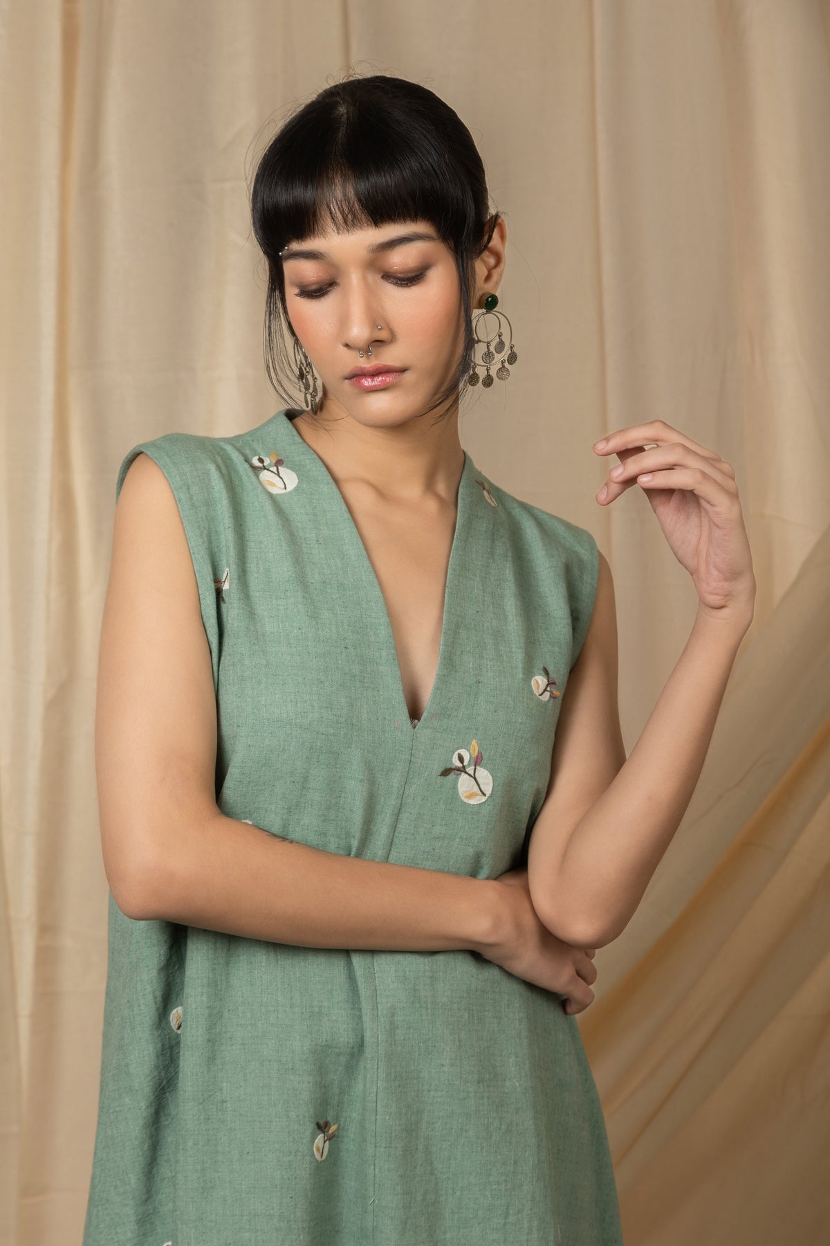 Sage green sleeveless embroidered midi dress