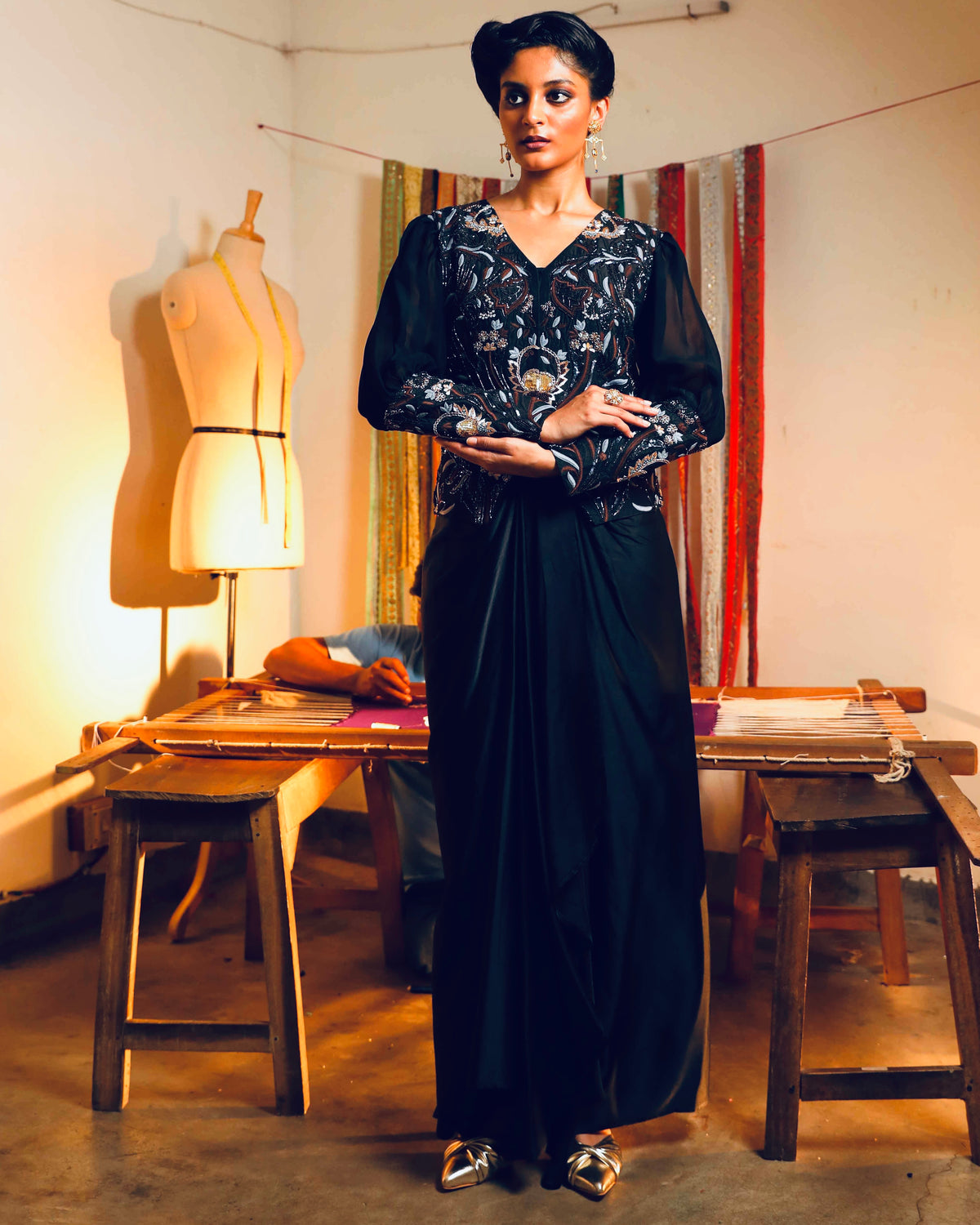 Black silk jacket with a fluid modal skirt.
